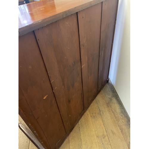 997 - A mahogany chest, having two short and three long drawers, 121 cm wide