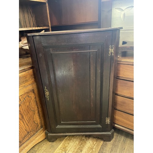 1019 - An oak dresser, 90 cm wide, a mahogany bookcase, a mahogany chair, a corner cabinet, a wine table, a... 