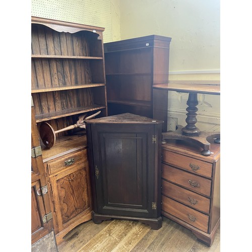 1019 - An oak dresser, 90 cm wide, a mahogany bookcase, a mahogany chair, a corner cabinet, a wine table, a... 