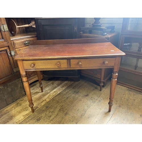 1003 - A mahogany side table, 100 cm wide, two oak bedside cupboards, a stool and a canterbury (5)