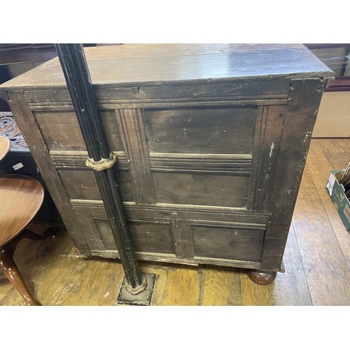 1025 - An oak chest, having two short and three long drawers, 102 cm wide