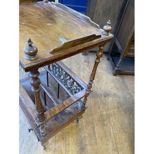 1038 - A Victorian walnut Canterbury whatnot, 56 cm wide