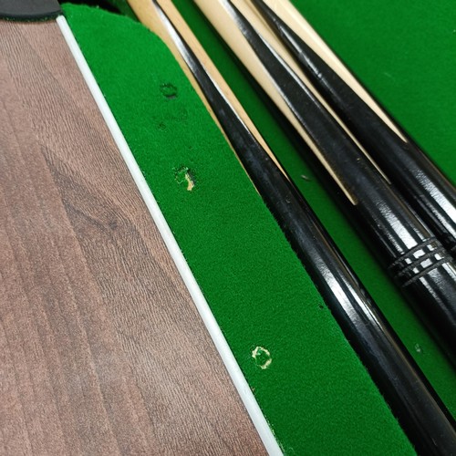 1079 - A pool table, with table tennis panels, a dart board and six cricket stumps (qty)