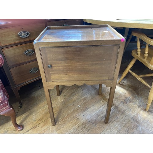 1048 - A mahogany dressing table, a wingback armchair, a wine table, and a tray top commode (4)