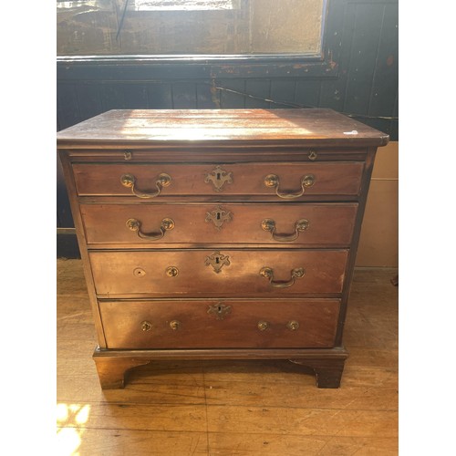 1049 - A 19th century mahogany chest, having a brushing slide above four long graduated drawers, 76 cm wide