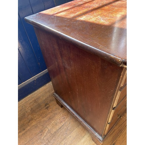 1049 - A 19th century mahogany chest, having a brushing slide above four long graduated drawers, 76 cm wide