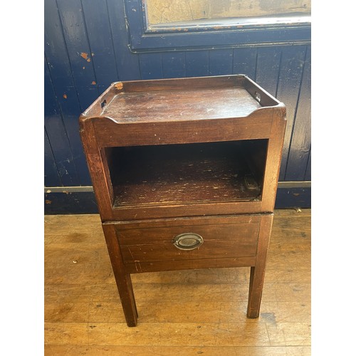 1050 - An oak revolving bookcase, 64 cm diameter, a tray top commode, another, two lamps and a triptych mir... 