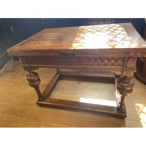 1051 - A 17th century Dutch style oak drawleaf dining table, on bulbous legs united by stretchers, the top ... 