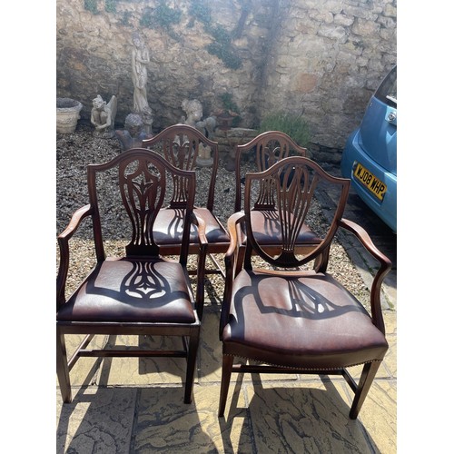 1066 - A pair of shield back armchairs, and assorted other chairs (13)