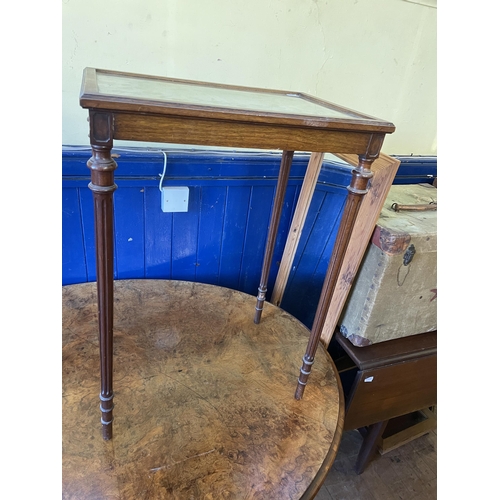 1088 - A Victorian walnut oval table, 125 cm wide, a side table, inset with with an embroidered panel, a co... 