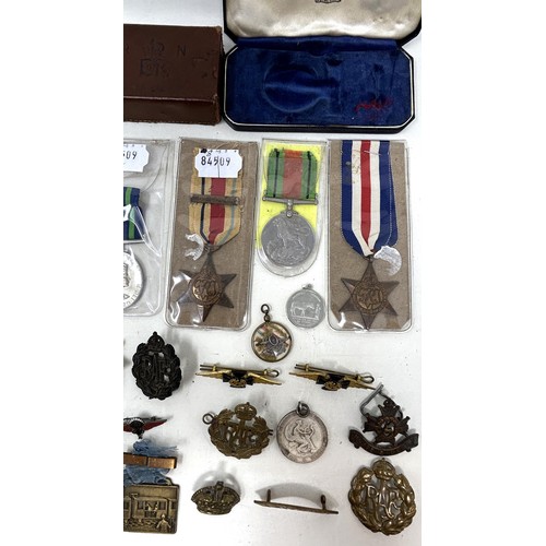 621 - Assorted medals, badges and other items