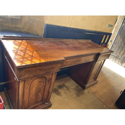 1107 - A 19th century mahogany sideboard, 206 cm wide, and a breakfast table (2)