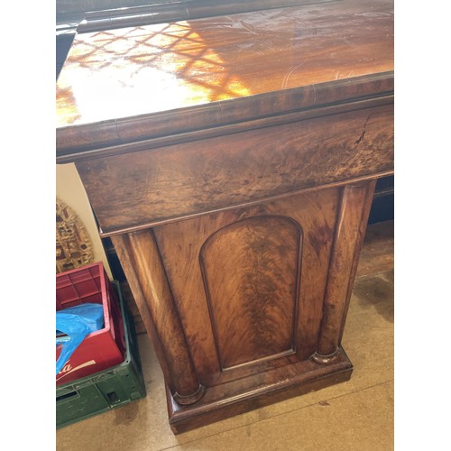 1107 - A 19th century mahogany sideboard, 206 cm wide, and a breakfast table (2)