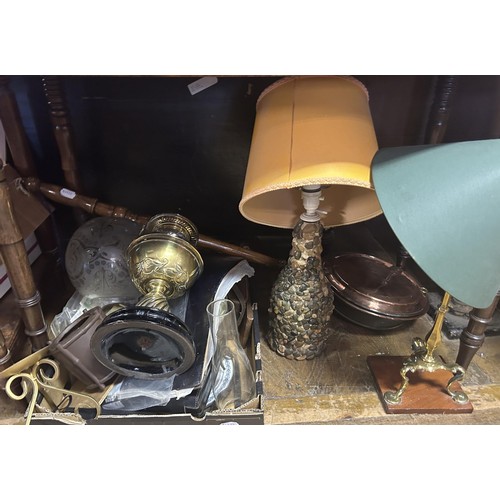 959 - A brass oil lamp, assorted walking sticks, prints, pictures and assorted items (qty)