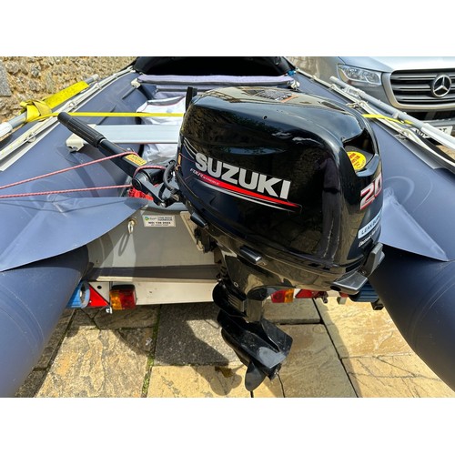 802 - An Excel Vanguard 395 inflatable dinghy, with a Suzuki 20hp Four Stroke lean burn engine, on an Extr... 