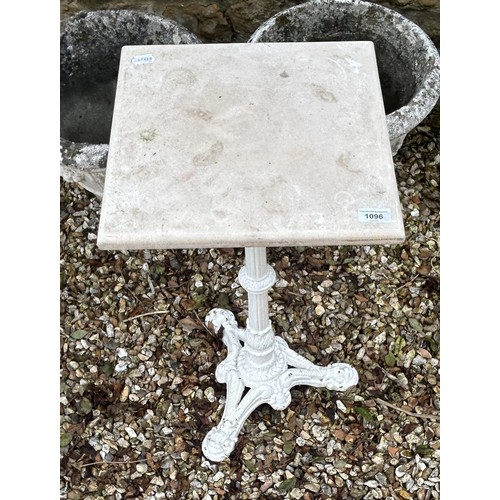 1096 - A painted cast iron table base, with a marble top, 36 cm wide