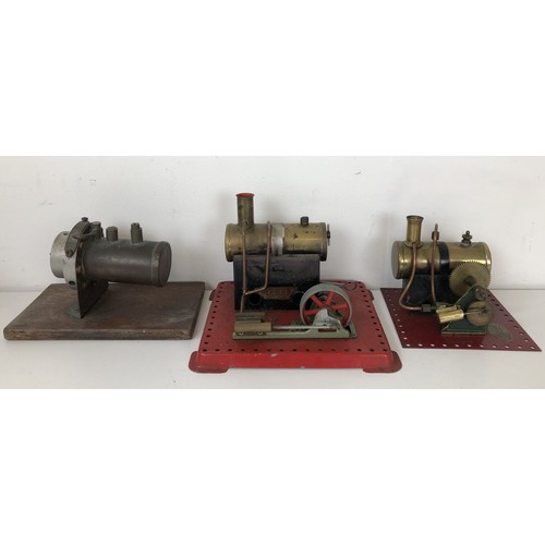 345 - A stationary steam engine, another, and part of a steam engine (box)