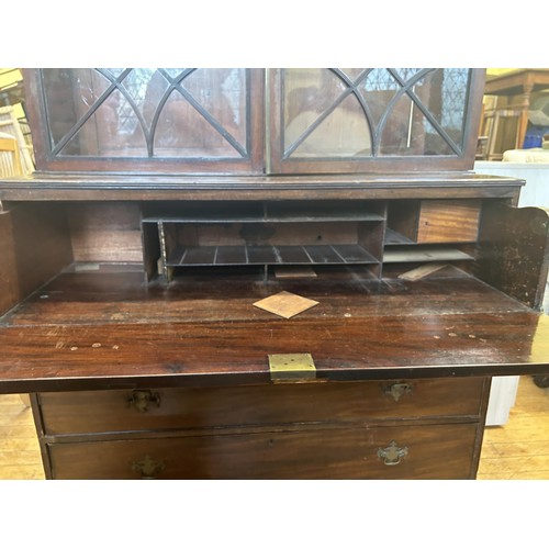 1075 - A 19th century mahogany secretaire bookcase, 124 cm wide