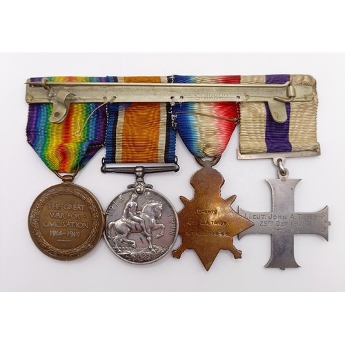 538 - A group of four medals, awarded to Lt John A Tandy, comprising a Military Cross, privately named and... 