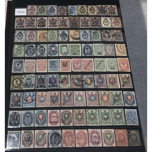 441 - A collection of world stamps, including Paraguay, Spanish Colony Cuba and others, in albums and loos... 