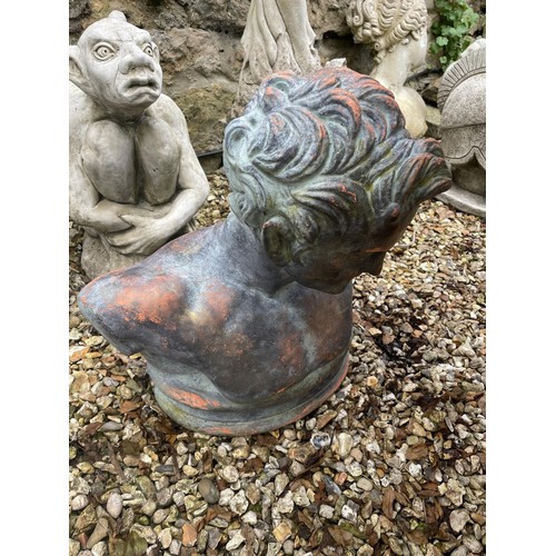 1109 - A composite stone figure in the form of a gargoyle, 50 cm high, and a composite stone garden bust (2... 