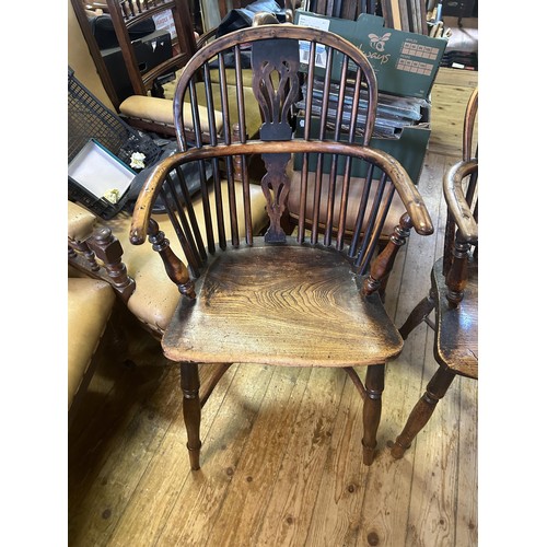 1026 - A pair of oak and elm Windsor chairs, and a pair of oak armchairs (4)