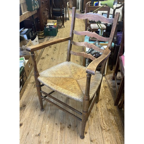 1026 - A pair of oak and elm Windsor chairs, and a pair of oak armchairs (4)