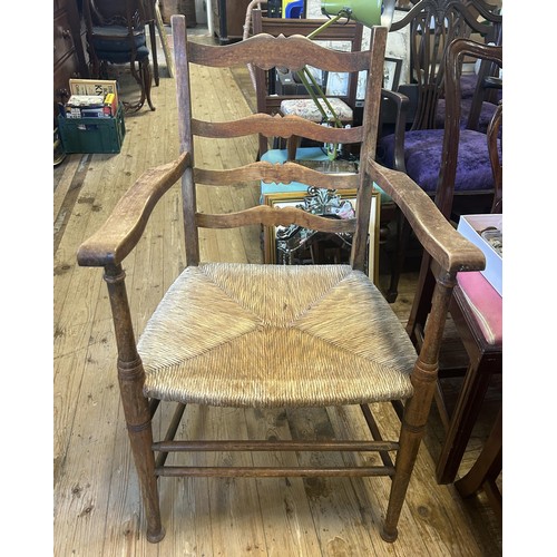 1026 - A pair of oak and elm Windsor chairs, and a pair of oak armchairs (4)