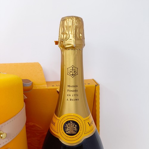 1211 - A magnum of Veuve Clicquot champagne, and a Veuve Clicquot City Traveller set, boxed (2)