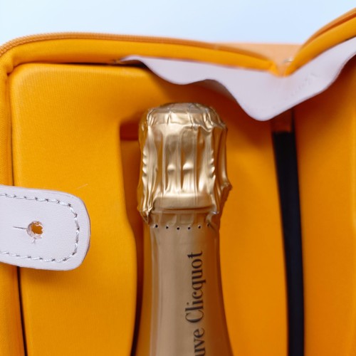 1211 - A magnum of Veuve Clicquot champagne, and a Veuve Clicquot City Traveller set, boxed (2)