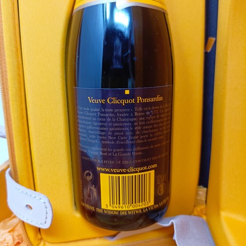 1211 - A magnum of Veuve Clicquot champagne, and a Veuve Clicquot City Traveller set, boxed (2)