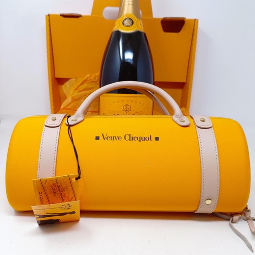 1211 - A magnum of Veuve Clicquot champagne, and a Veuve Clicquot City Traveller set, boxed (2)