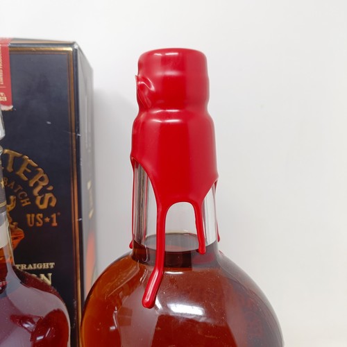 1214 - A bottle of Maker's Mark whisky, a bottle of Woodford Reserve whiskey, and another bottle of whisky,... 