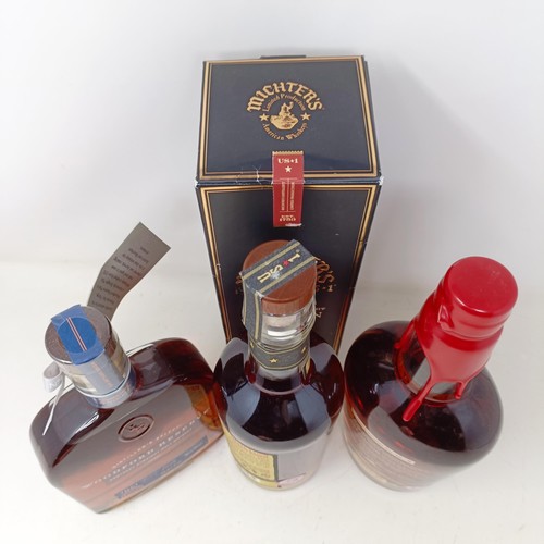 1214 - A bottle of Maker's Mark whisky, a bottle of Woodford Reserve whiskey, and another bottle of whisky,... 