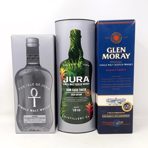 1215 - A bottle of Glen Moray single malt Scotch whisky, a bottle of Jura single malt whisky, and Jura Supe... 