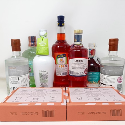 1224 - A litre bottle of Aperol, two bottles of Lazy Sunshine gin, a bottle of Plymouth gin, and other spir... 