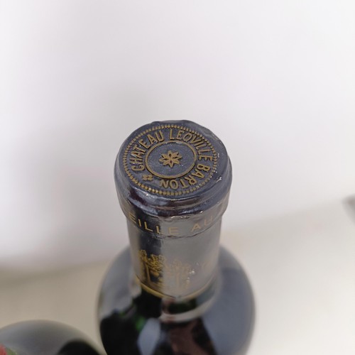 1239 - A bottle of Clos Fourtet Saint-Emilion Premier Grand Cru Classe, 1983, and three other bottles (4)