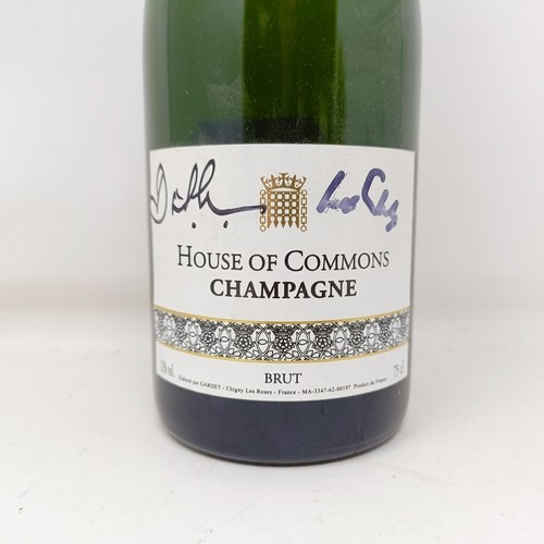 1250 - A bottle of House of Commons champagne, signed by David Cameron