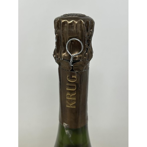 1326 - A bottle of Krug Grand Cuvee champagne