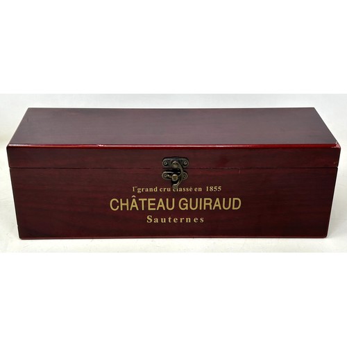 1329 - A bottle of Chateau Guiraud Premier Cru Sauternes, 1998, in a presentation box with wine accessories