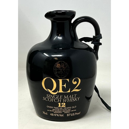 1332 - A commemorative whisky jug, Cunard QE2, containing 12 year old Scotch whisky, in a presentation box