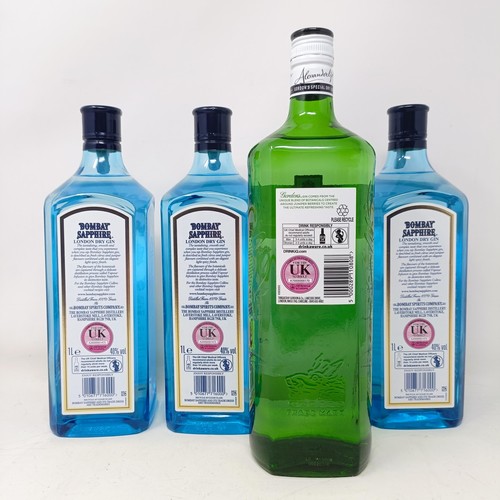 1268 - Three litre bottles of Bombay Sapphire, and a litre bottle of Gordon's gin (4)