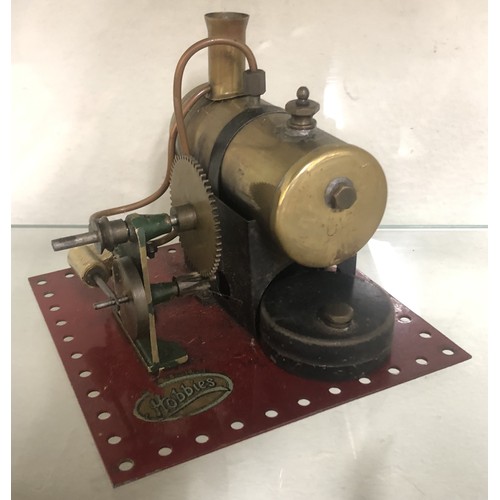 345 - A stationary steam engine, another, and part of a steam engine (box)