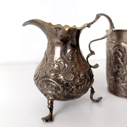 1062 - A 19th century silver cream jug and a Russian silver beaker, with assay master mark for Anatoly Apol... 