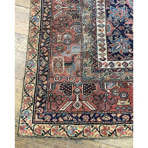 1126 - A Persian red ground carpet, 400 x 222 cmProvenance: On instructions of the Executors - From the est... 