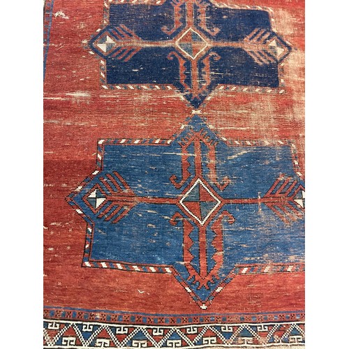 1125 - A Persian red ground rug, 162 x 167 cmProvenance: On instructions of the Executors - From the estate... 