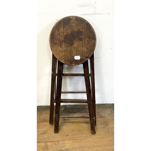 1100 - A folding stool/steps, 60 cm high, and a Continental painted side table, 54 cm wide (2)Provenance: O... 