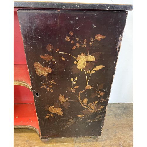 1107 - A lacquered pine cupboard, with an open section flanked by two cupboard doors, decorated flowers and... 