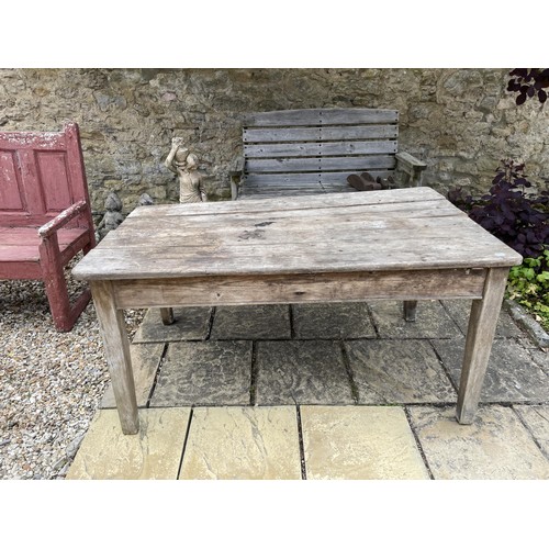 1141 - A weathered pine table, 153 cm wide, a pair of folding chairs, a folding table and a metal trunk (4)... 