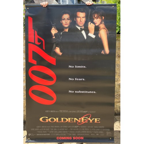 169 - James Bond 007 Goldeneye (1995) double sided banner, 115 cm wide, a Cut Throat Island banner, and a ... 